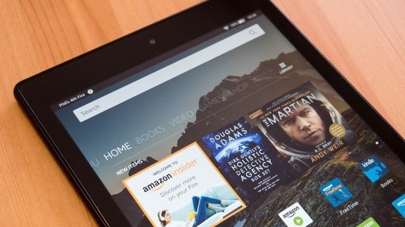 One of the best Fire tablets just got hit with 50% OFF ahead of Black Friday Amazon Fire HD 10 on a wooden table