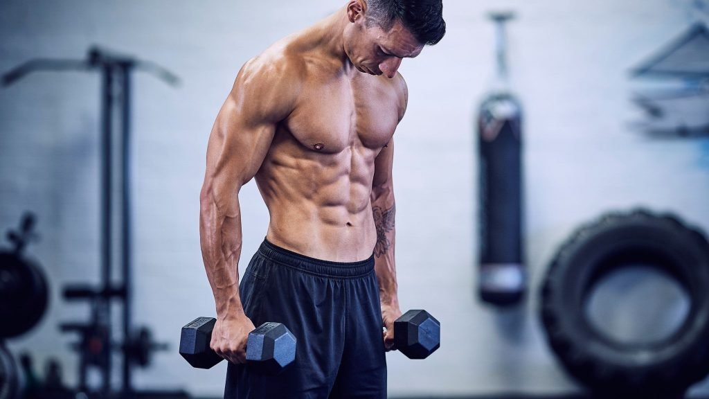 What is the 'Run the Rack' Dumbbell method, and how does it build muscle mass?