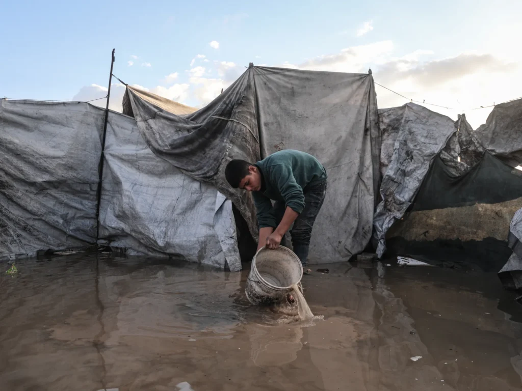 Palestinians suffer flooded tents and debris as cold and rain lash Gaza | Israel-Palestine conflict News