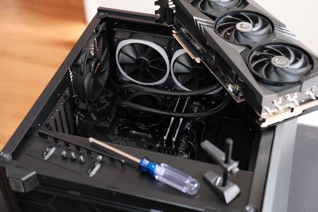 DIY PC building is a no-fly zone in 2026. (Thanks, RAM.) Now what? PC building - open computer case with parts still to be installed