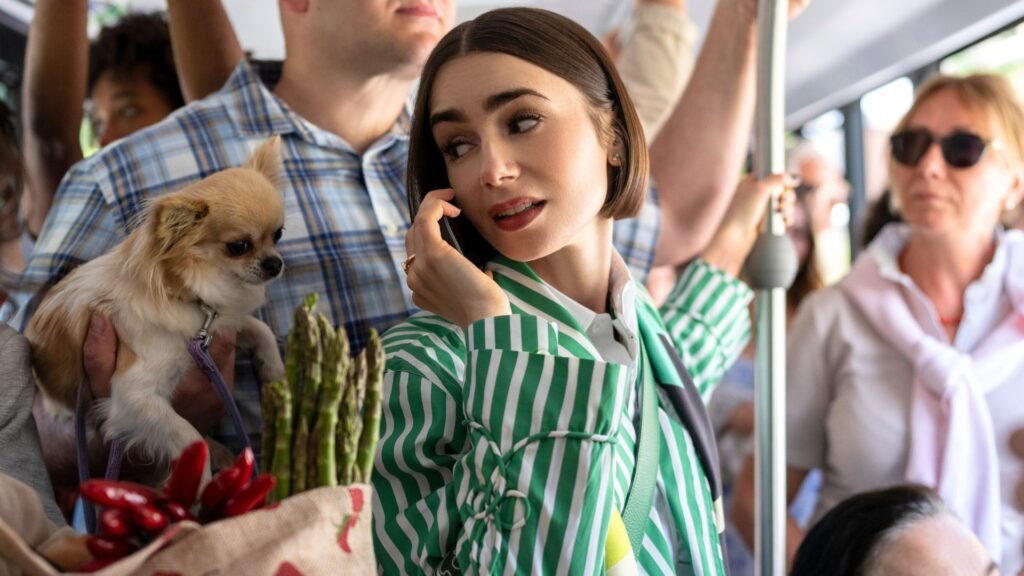 Emily in Paris season 6: everything we know about the hit Netflix show’s return Emily looks at a dog on a packed bus