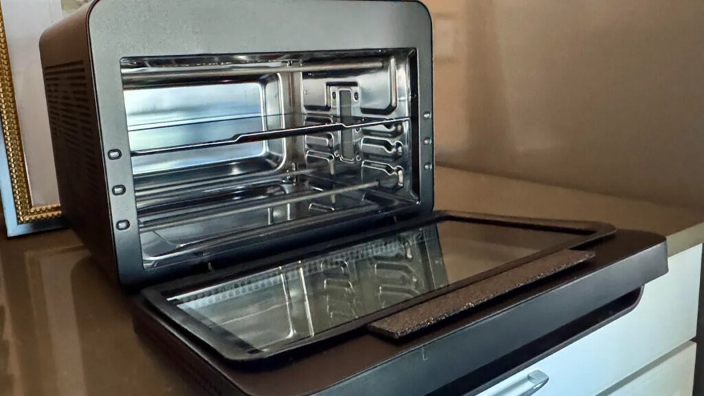 The iQ MiniOven sitting on a kitchen countertop.