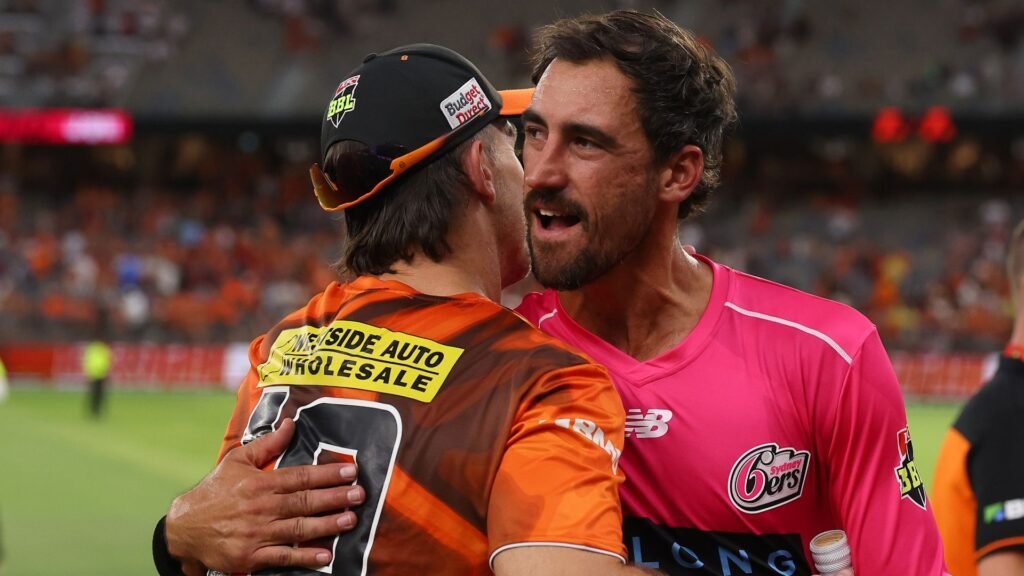 Mitchell Marsh of the Scorchers Mitchell Starc of the Sixers embrace ahead of the 2026 BBL Final