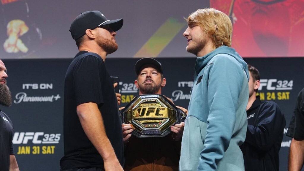 Justin Gaethje and Paddy Pimblett face off at a press conference ahead of their UFC 324 match in Las Vegas, Nevada.