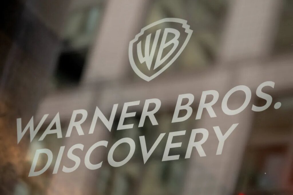 Netflix backs out of bid for Warner Bros. Discovery, giving studios, HBO, and CNN to Ellison-owned Paramount Signage at the Warner Bros. Discovery headquarters in New York