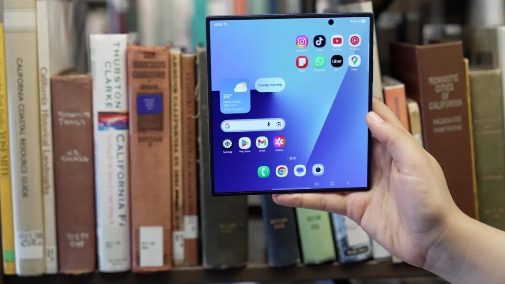 Samsung’s One UI Code Hints at Existence of ‘Wide’ Galaxy Z Fold A hand holds an unfolded Galaxy Z Fold 7