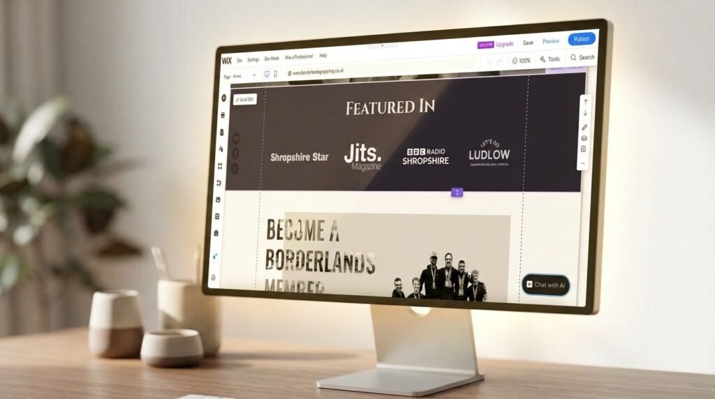 A screenshot of the Borderlands Grappling website built on Wix on a mac on top of a modern desk