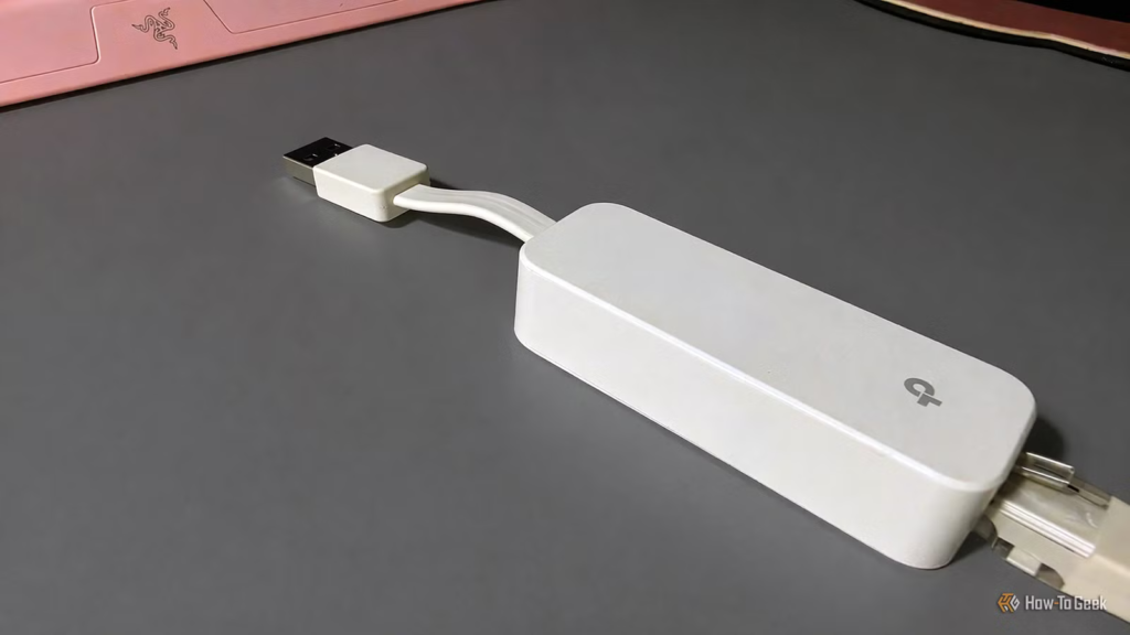 I test high-end routers for a living, but this $10 USB dongle is secretly my most valuable networking tool