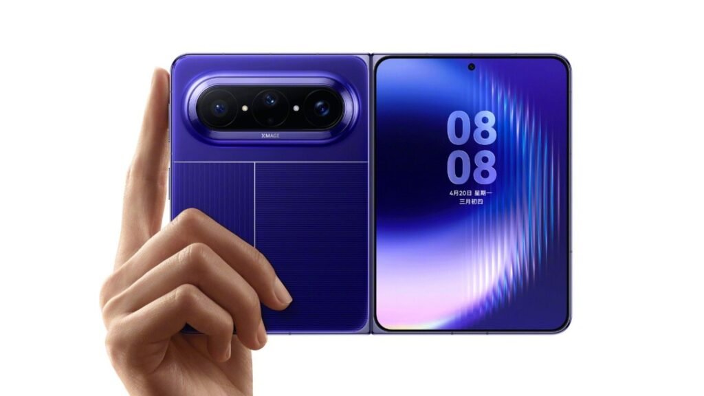 close-up of Huawei Pura X Max in blue held in a hand, showing its inner screen and back panel